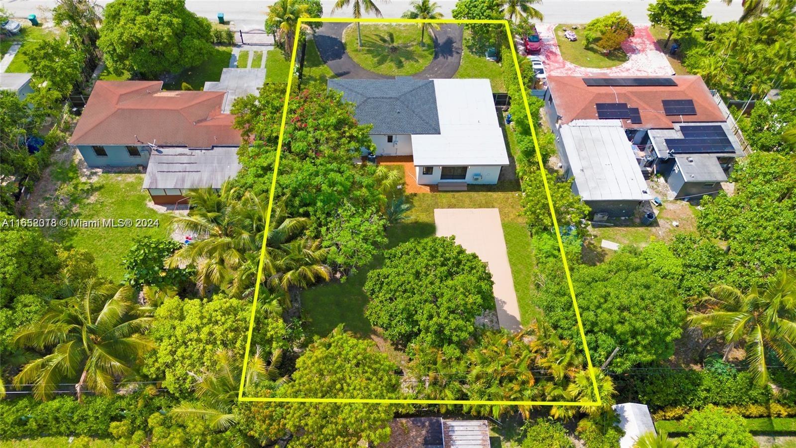 151 Northwest 146th Street Miami, FL 33168 - Photo 34 of 35 an aerial view of house with swimming pool outdoor seating and yard