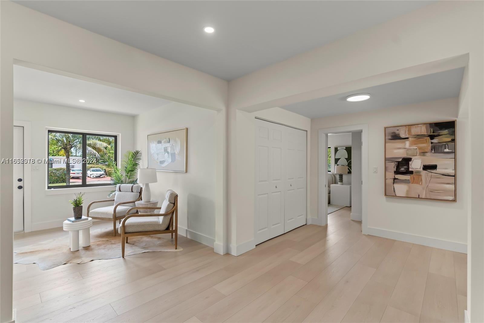 151 Northwest 146th Street Miami, FL 33168 - Photo 8 of 35 a view of a livingroom with furniture and white walls