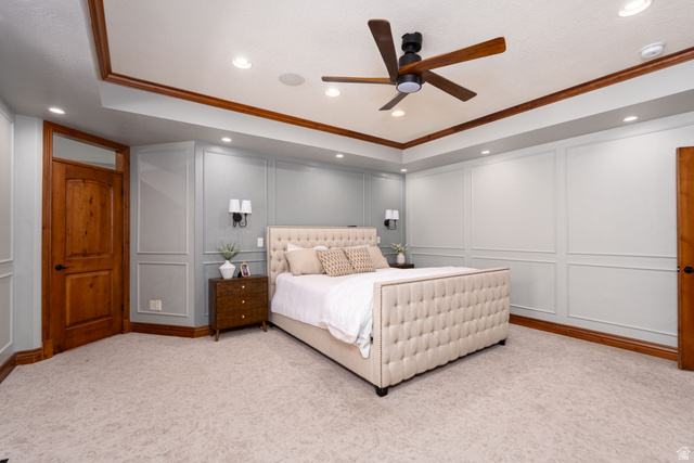 687 South 2080th Street East Springville, UT 84663 - Photo 16 of 149 Recessed lighting illuminates the tray ceiling with wood-finish trim and a ceiling fan