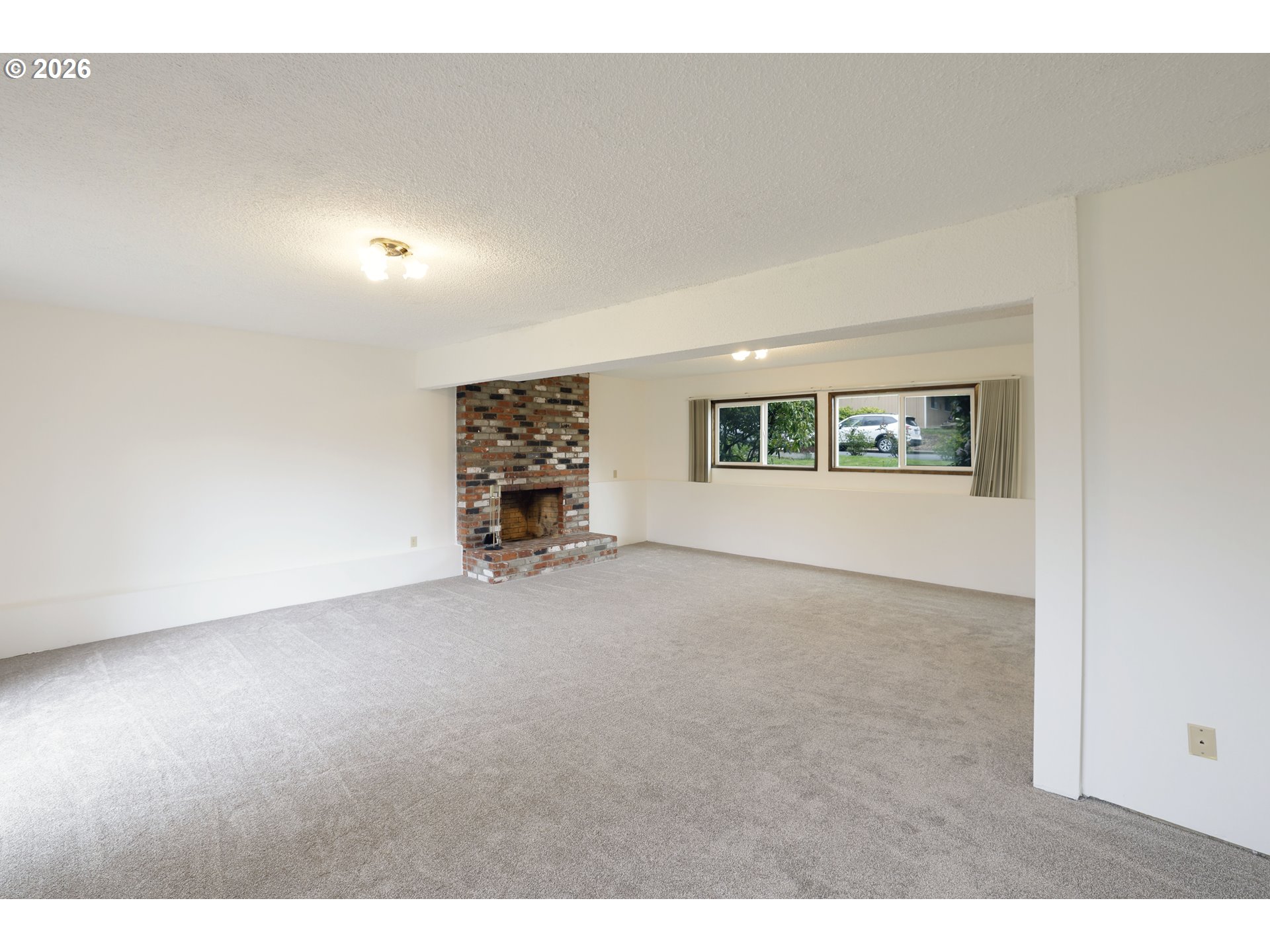 16285 Southwest Rosa Road Beaverton, OR 97007 - Photo 14 of 20 an empty room with a empty space and windows