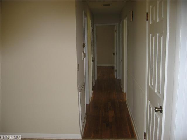 1060 Linger Road Winston-Salem, NC 27127 - Photo 13 of 16 Other. Hardwoods and new interior doors in the hallway