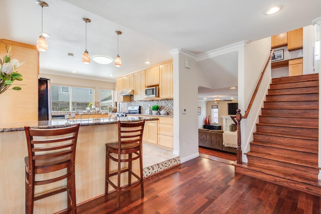 3129 Bilbo Drive San Jose, CA 95121 - Photo 11 of 34 a view of kitchen with furniture and wooden floor