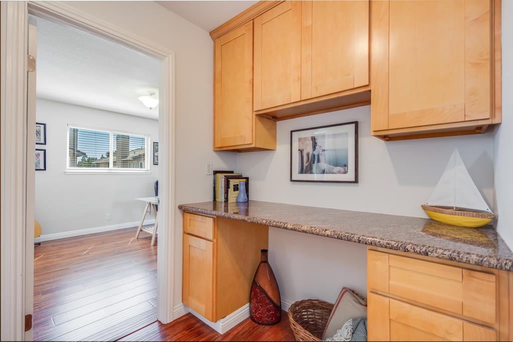 3129 Bilbo Drive San Jose, CA 95121 - Photo 18 of 34 a hallway with painting on the wall and a window