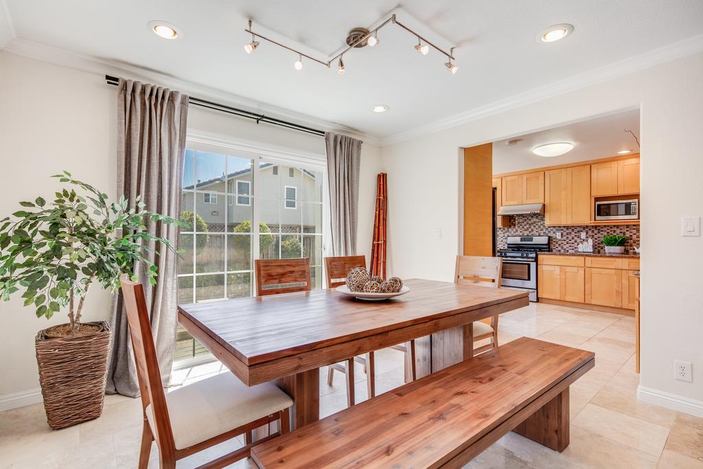3129 Bilbo Drive San Jose, CA 95121 - Photo 6 of 34 a view of a dining room with furniture window and wooden floor