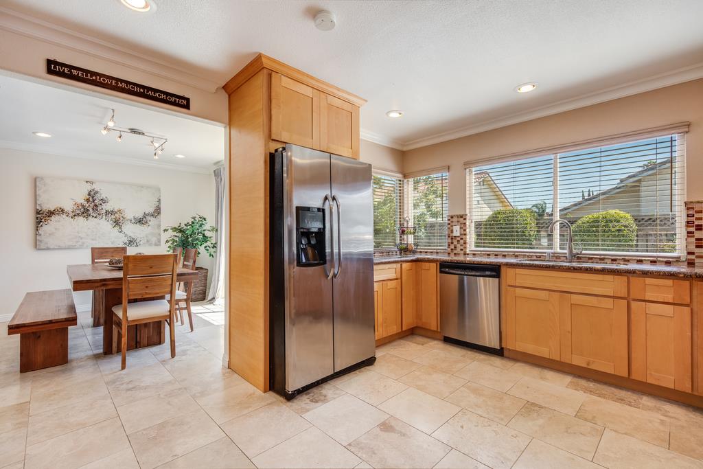 3129 Bilbo Drive San Jose, CA 95121 - Photo 7 of 34 a kitchen with stainless steel appliances granite countertop a refrigerator and a sink