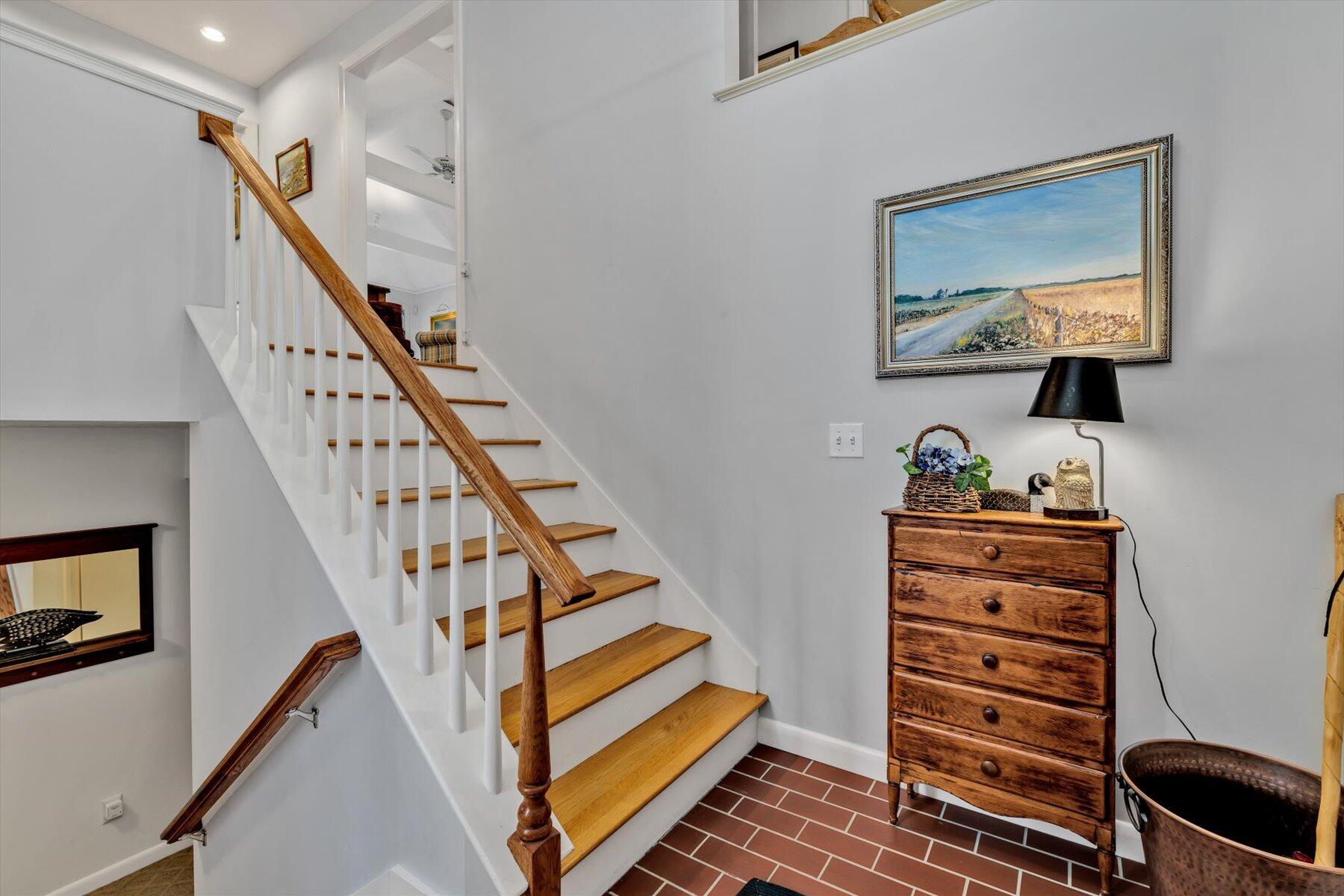 5 Tide Run Mashpee, MA 02649 - Photo 18 of 64 a view of a hallway with stairs and furniture