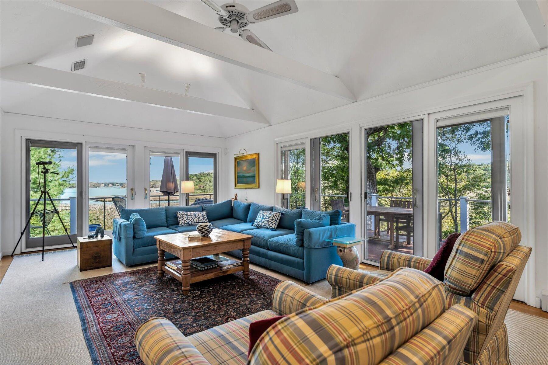 5 Tide Run Mashpee, MA 02649 - Photo 22 of 64 a living room with furniture and large windows