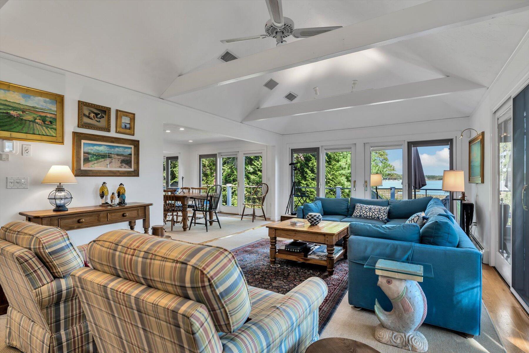 5 Tide Run Mashpee, MA 02649 - Photo 23 of 64 a living room with furniture large window and wooden floor