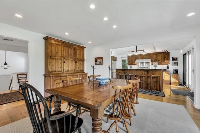 a bedroom with a bed and a table in it