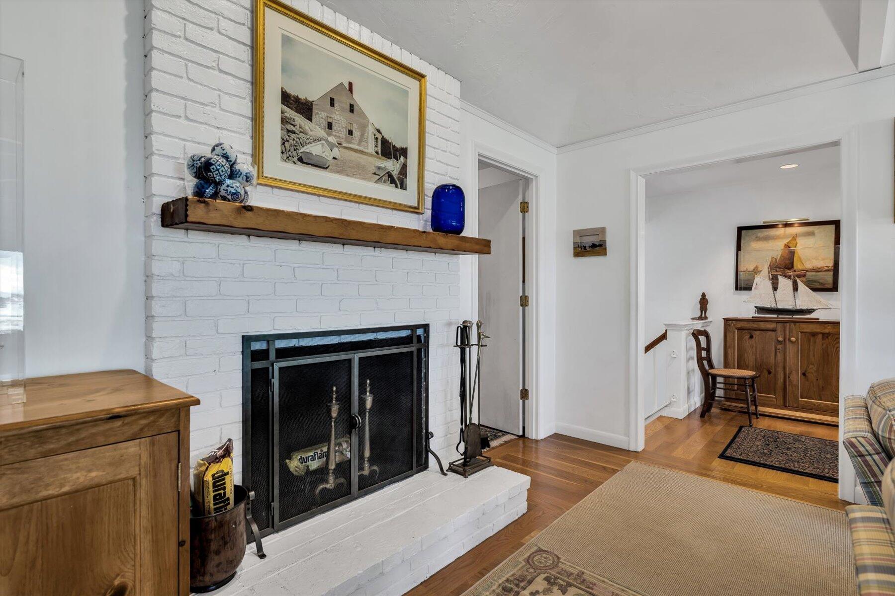 5 Tide Run Mashpee, MA 02649 - Photo 37 of 64 a living room with furniture and a fireplace