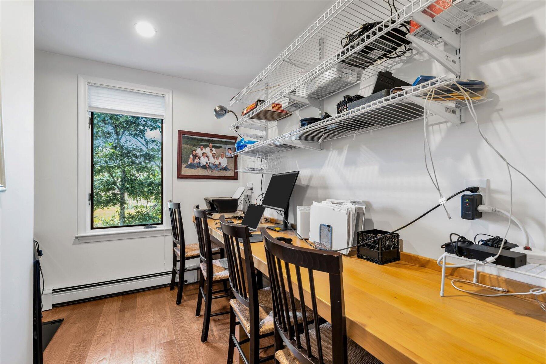 5 Tide Run Mashpee, MA 02649 - Photo 38 of 64 a view of a dining room with furniture window and wooden floor