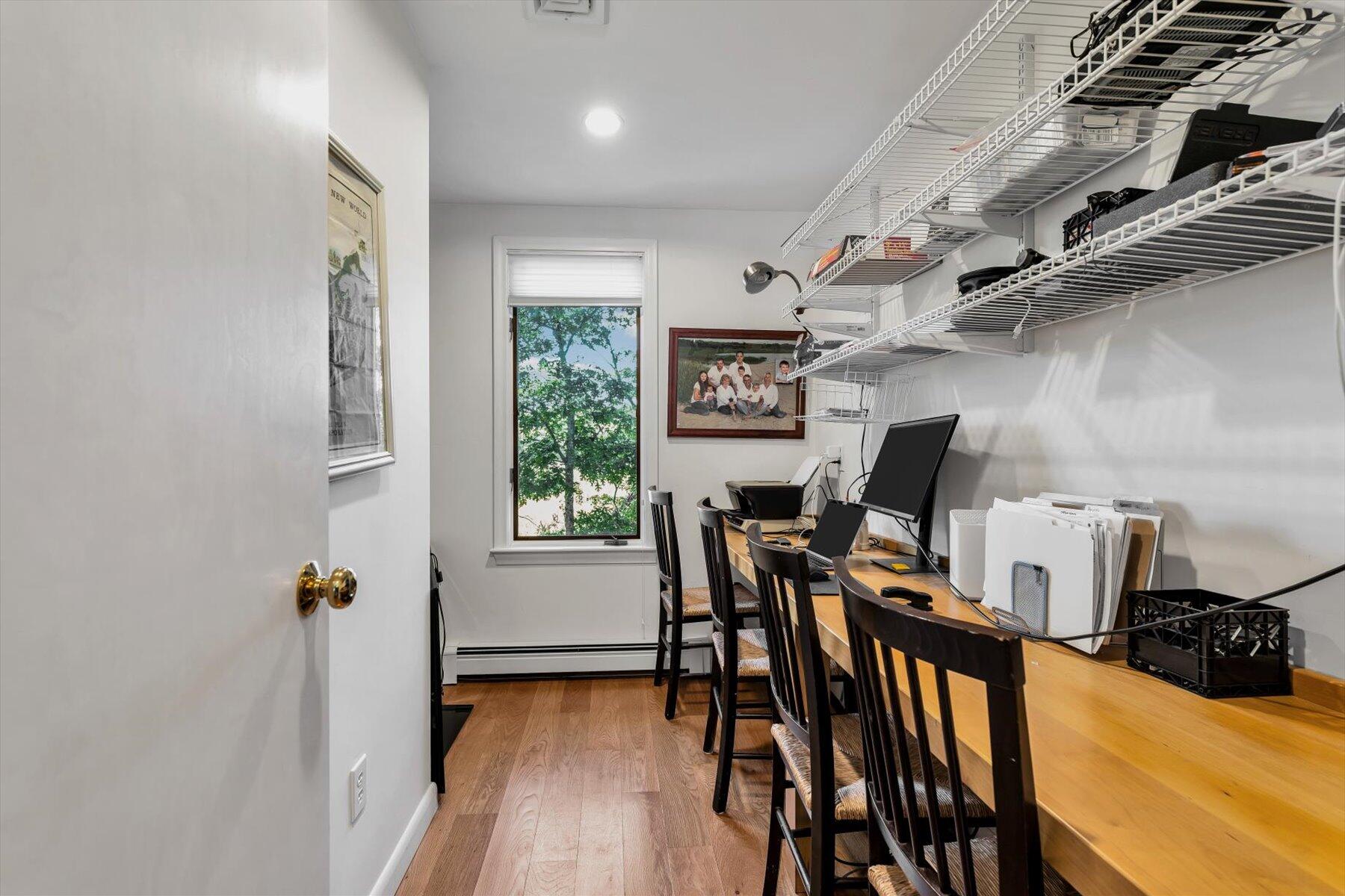 5 Tide Run Mashpee, MA 02649 - Photo 39 of 64 a dining room with furniture and wooden floor
