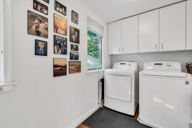 a bedroom with a bed and a chair