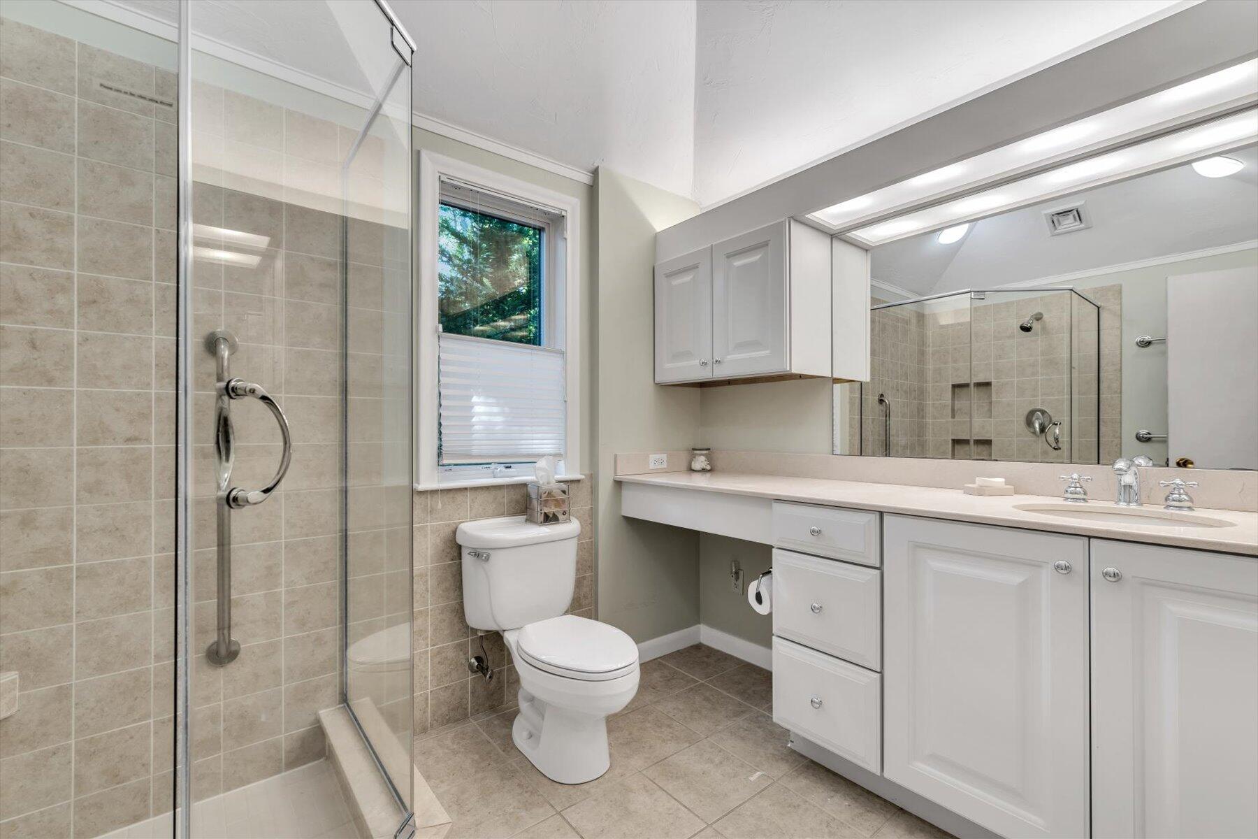 5 Tide Run Mashpee, MA 02649 - Photo 45 of 64 a bathroom with a double vanity sink toilet and shower