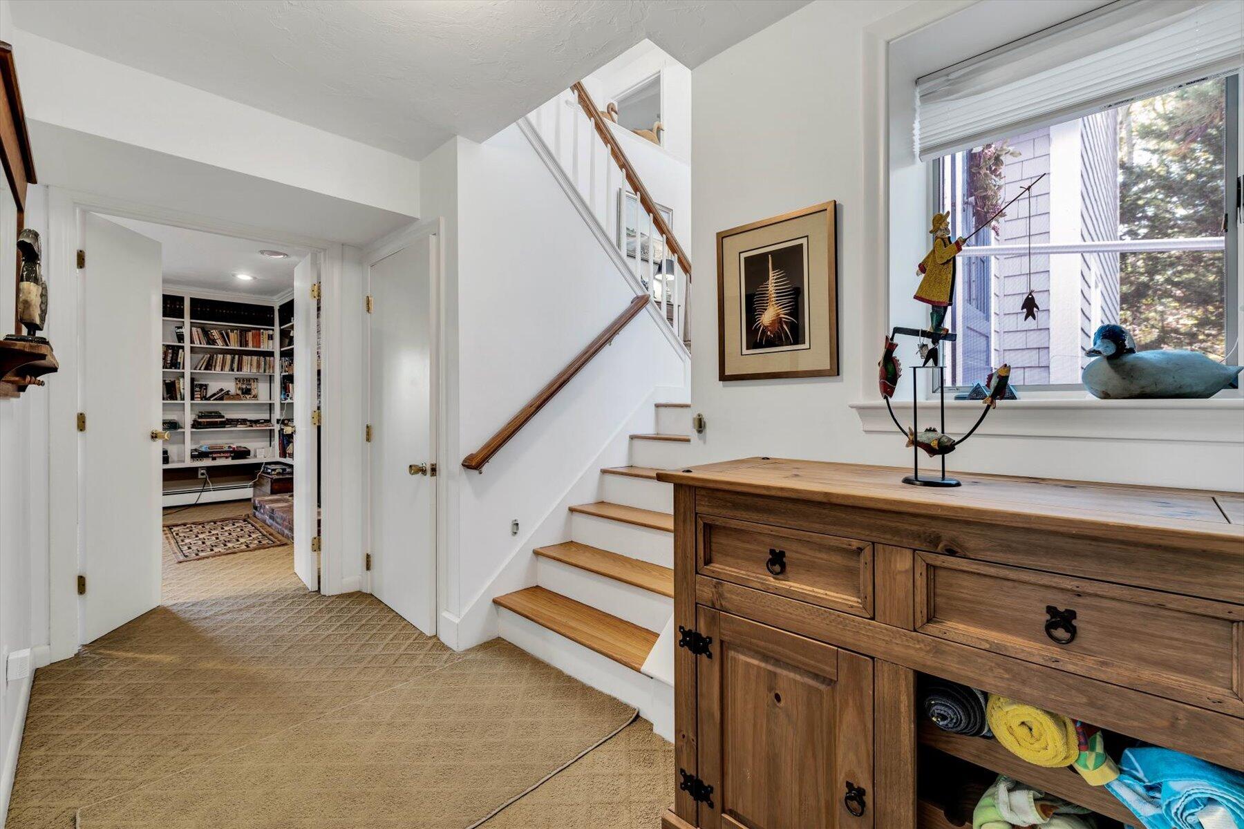 5 Tide Run Mashpee, MA 02649 - Photo 46 of 64 a view of entryway and hall with wooden floor