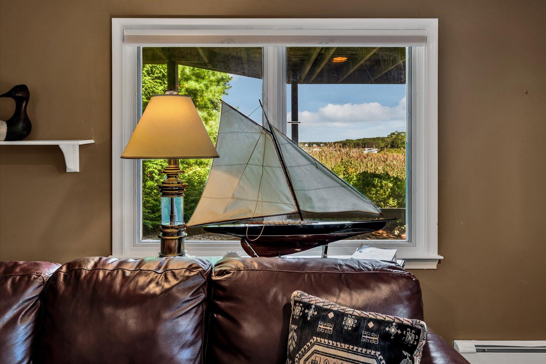 5 Tide Run Mashpee, MA 02649 - Photo 50 of 64 a bed sitting in a bedroom next to a window