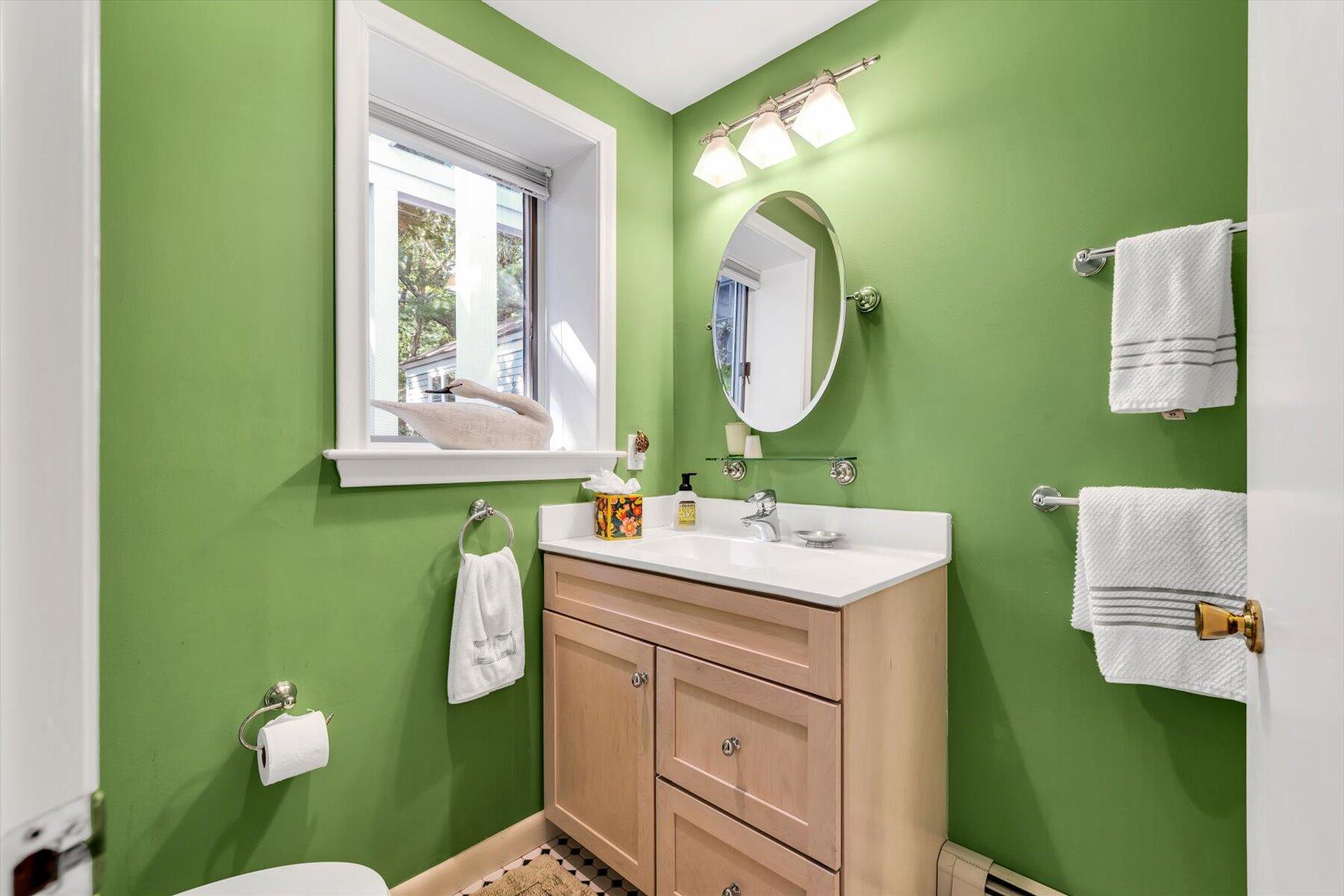 5 Tide Run Mashpee, MA 02649 - Photo 58 of 64 a bathroom with a toilet mirror and a sink