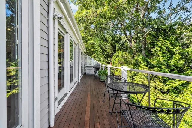 a view of a balcony with lake view and mountain view
