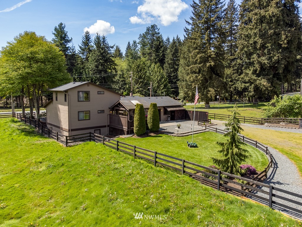 4903 169th Street Southeast Bothell, WA 98012 - Photo 4 of 32 swimming pool view with a seating space