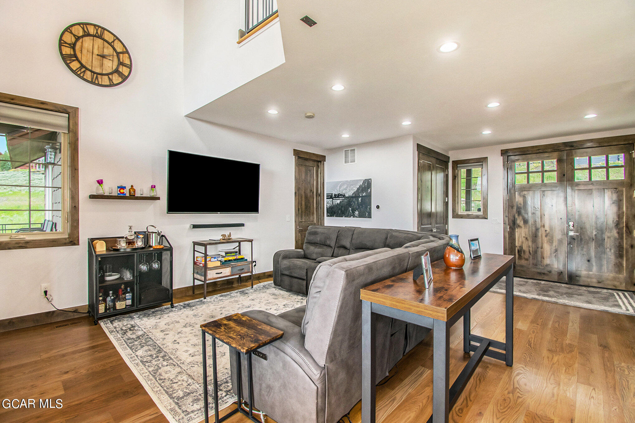 609 Lower Ranch View Drive Granby, CO 80446 - Photo 13 of 54 a living room with furniture and a flat screen tv