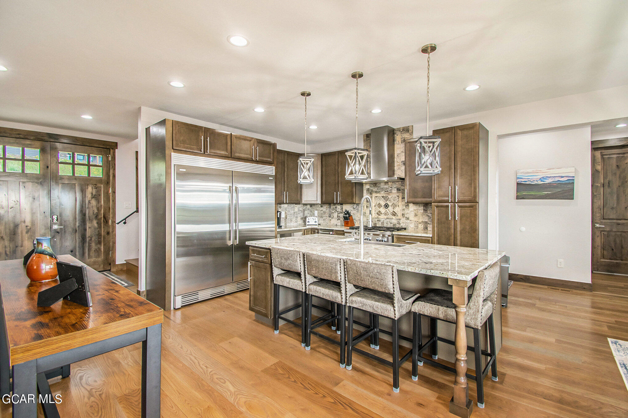 609 Lower Ranch View Drive Granby, CO 80446 - Photo 14 of 54 a large kitchen with a table and chairs