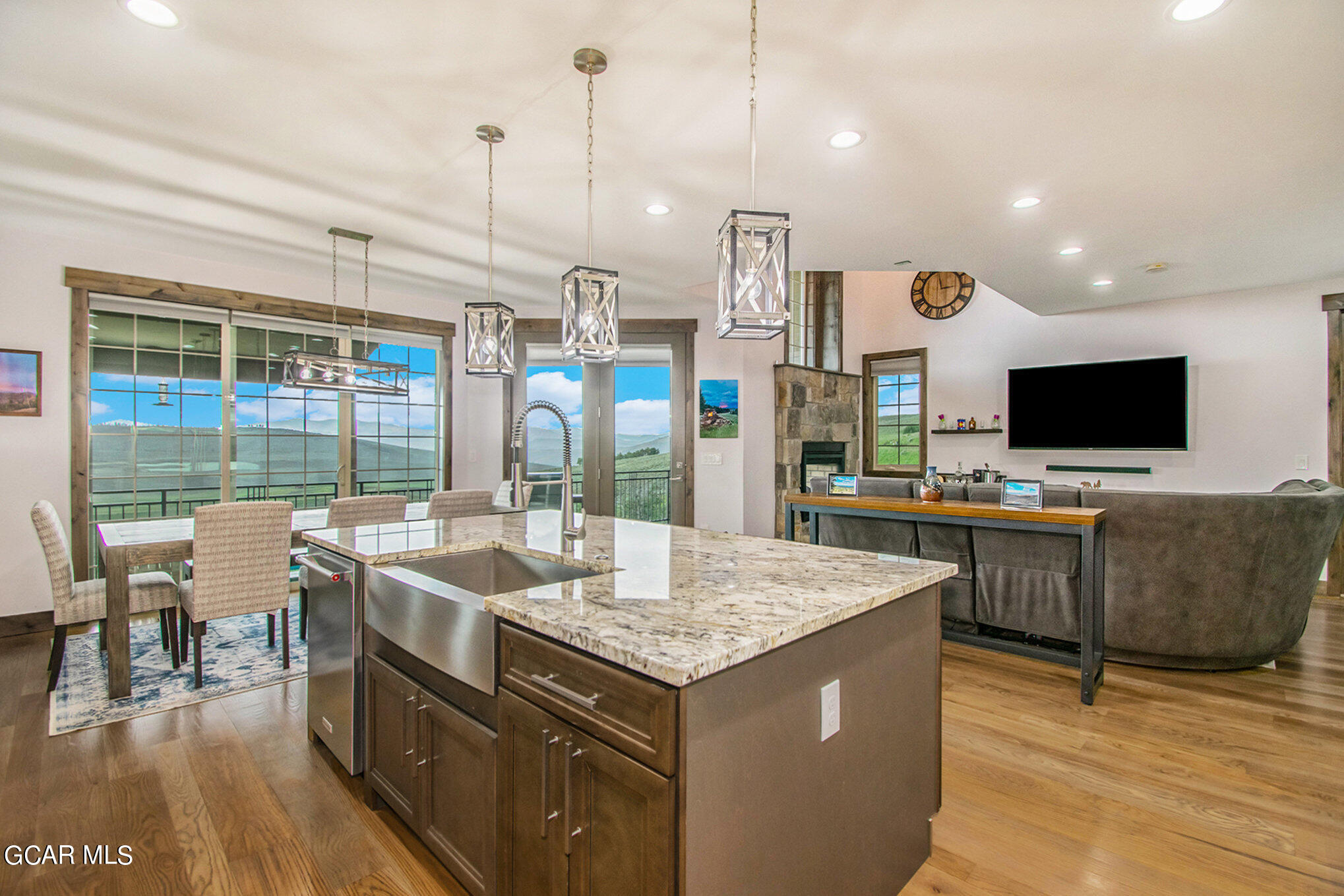 609 Lower Ranch View Drive Granby, CO 80446 - Photo 16 of 54 a open kitchen with stainless steel appliances granite countertop a stove and cabinets