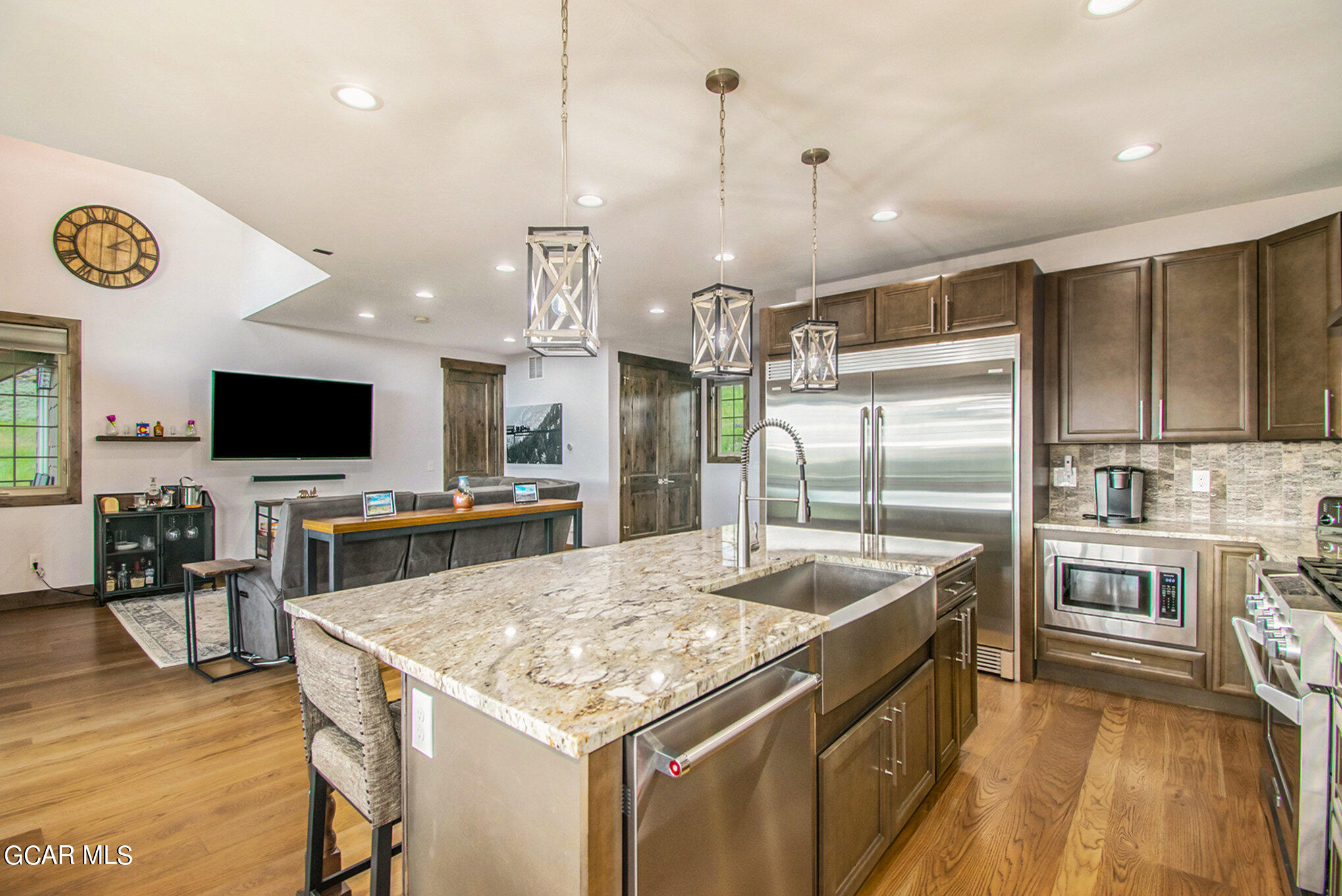609 Lower Ranch View Drive Granby, CO 80446 - Photo 17 of 54 a kitchen with stainless steel appliances granite countertop a sink stove and refrigerator