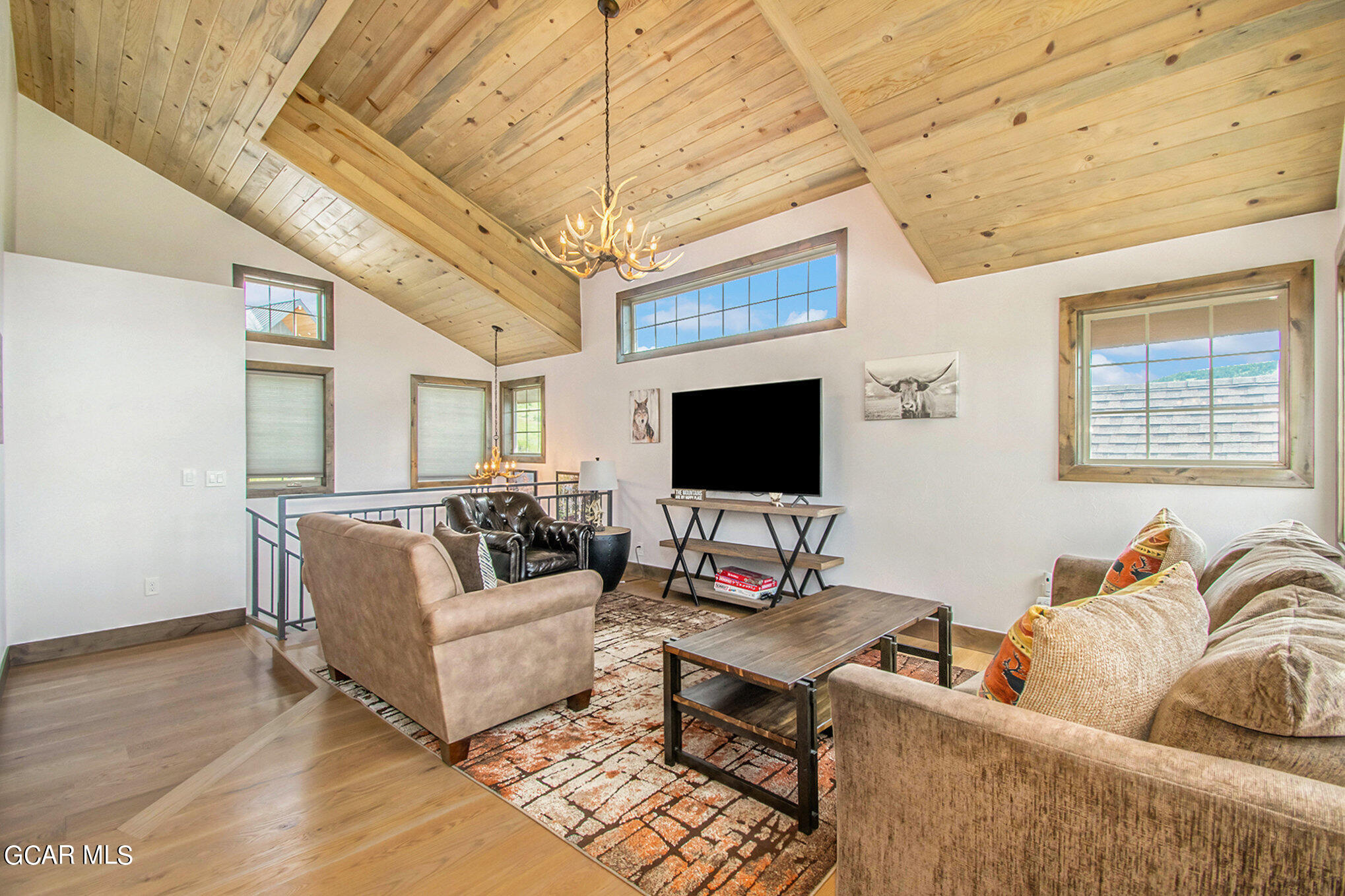 609 Lower Ranch View Drive Granby, CO 80446 - Photo 22 of 54 a living room with furniture and a flat screen tv