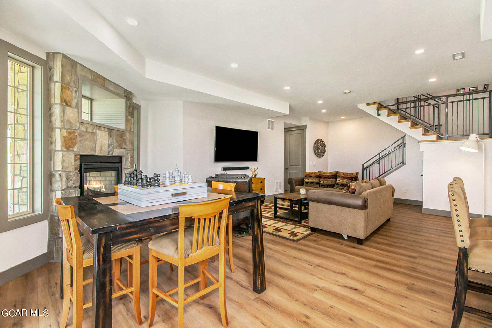 609 Lower Ranch View Drive Granby, CO 80446 - Photo 29 of 54 a living room with furniture and a flat screen tv