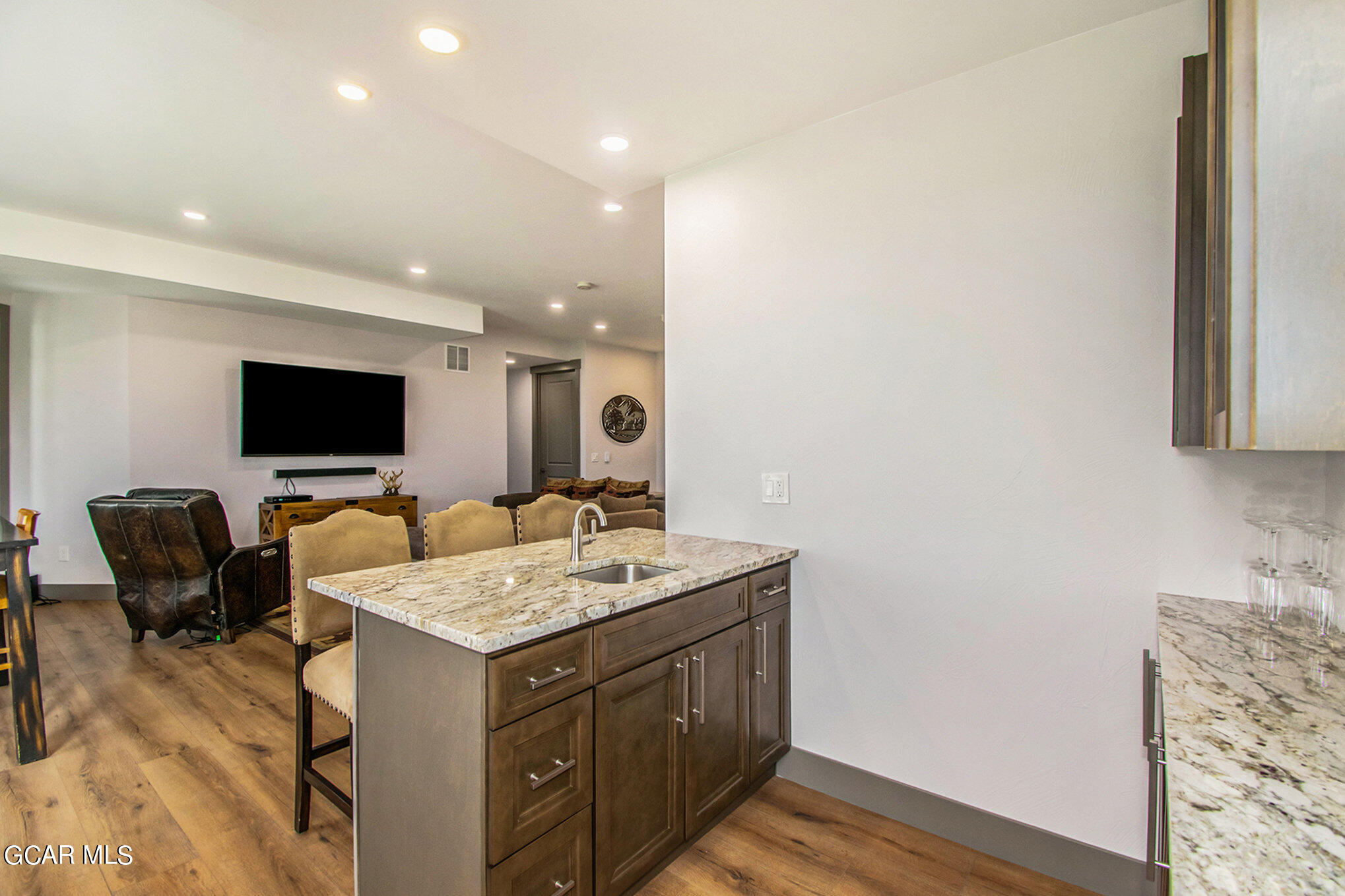 609 Lower Ranch View Drive Granby, CO 80446 - Photo 30 of 54 a bathroom with a double vanity sink and a mirror