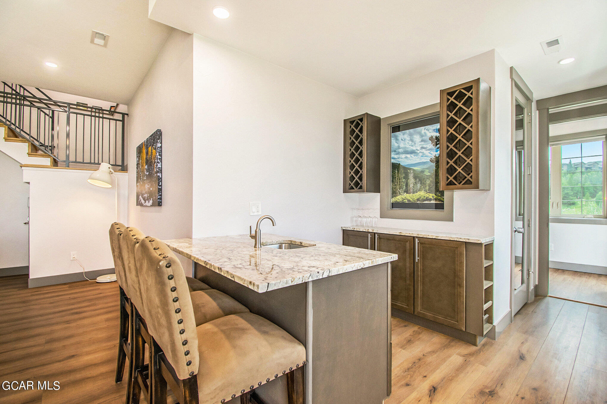609 Lower Ranch View Drive Granby, CO 80446 - Photo 31 of 54 a dining room with furniture and wooden floor
