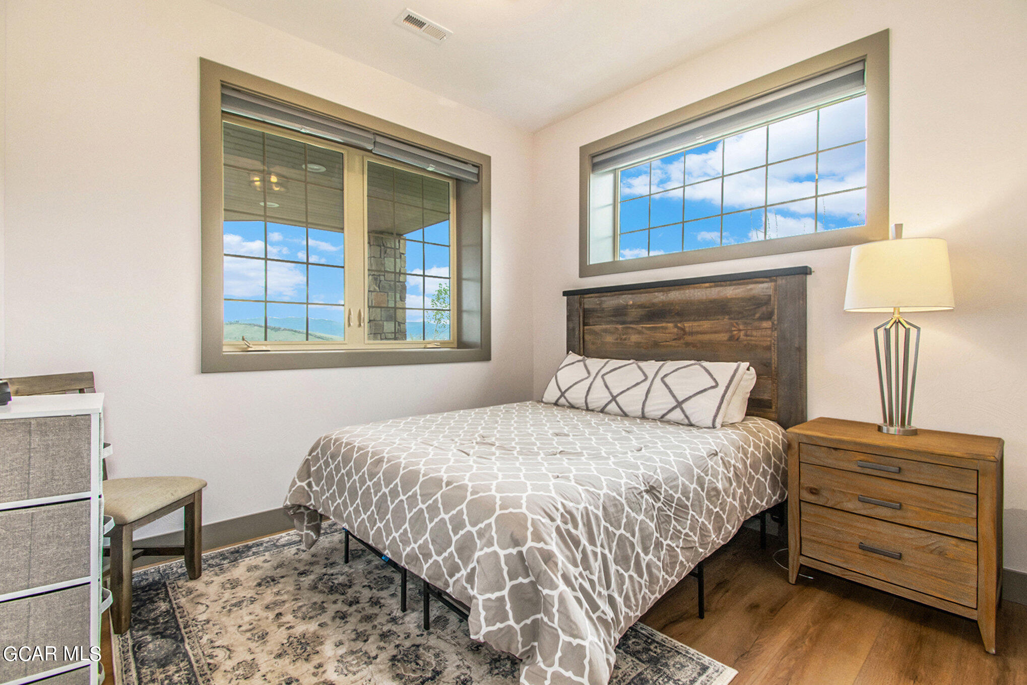 609 Lower Ranch View Drive Granby, CO 80446 - Photo 34 of 54 a bedroom with a bed and a window