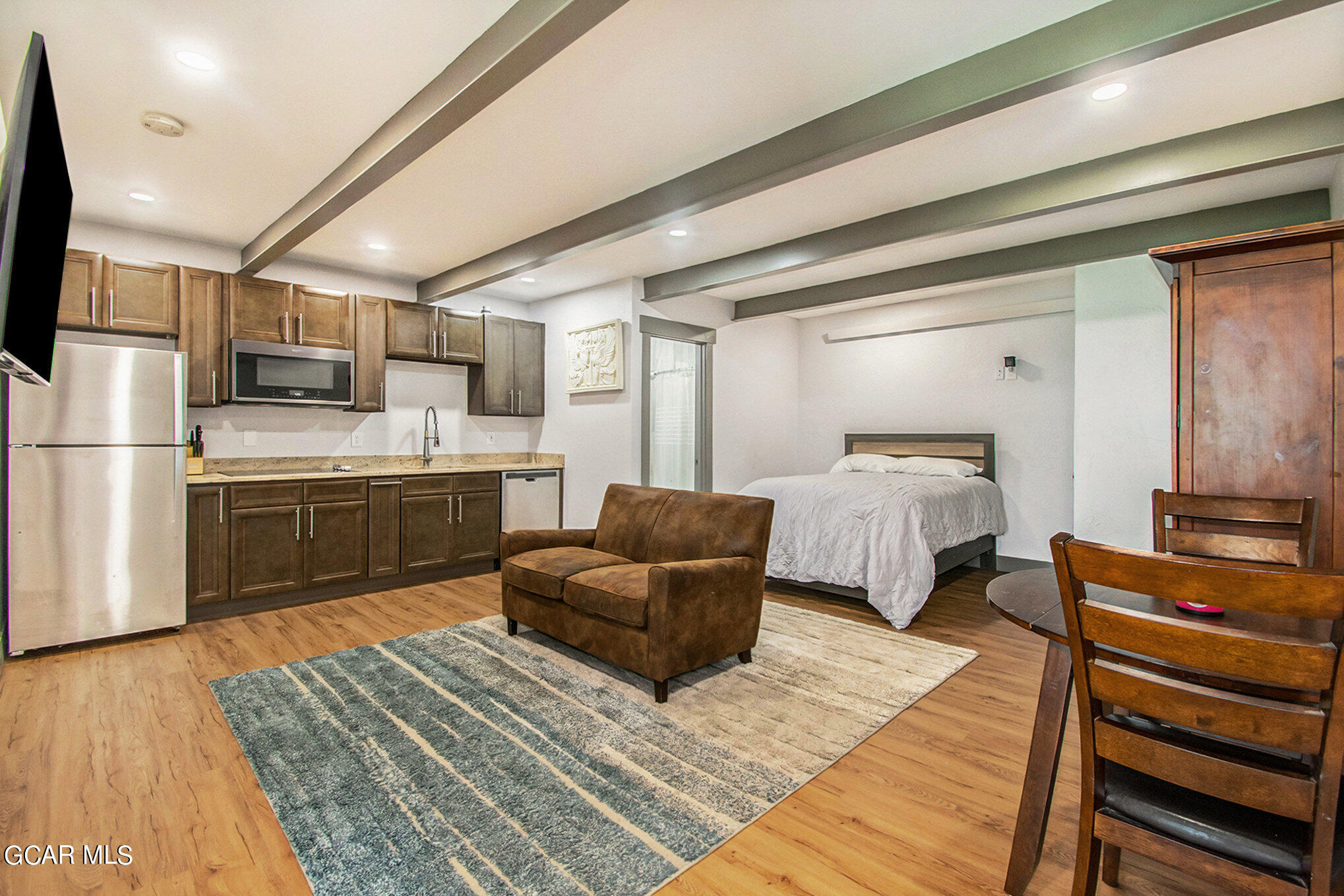 609 Lower Ranch View Drive Granby, CO 80446 - Photo 37 of 54 a bedroom with a bed and a couch