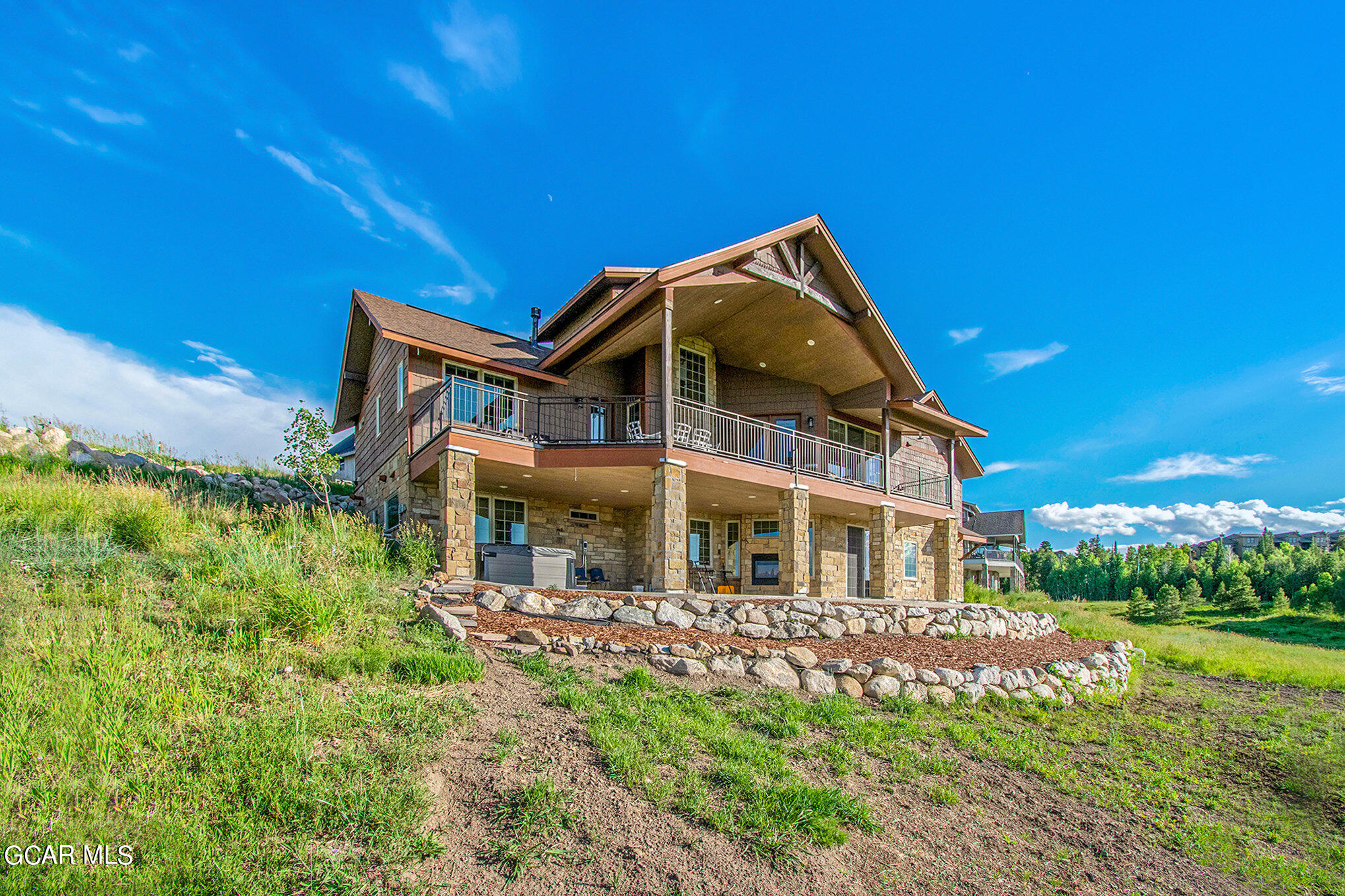 609 Lower Ranch View Drive Granby, CO 80446 - Photo 47 of 54 a view of a house with a yard