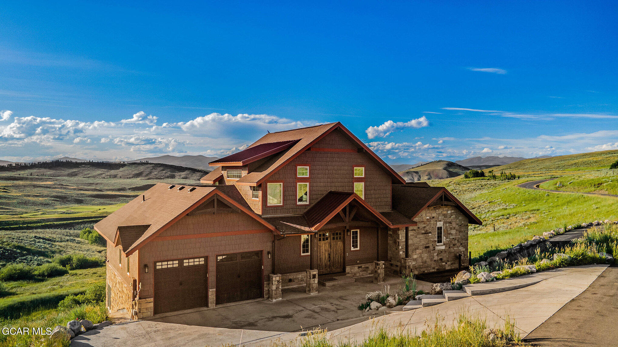 609 Lower Ranch View Drive Granby, CO 80446 - Photo 6 of 54 a front view of a house with a yard