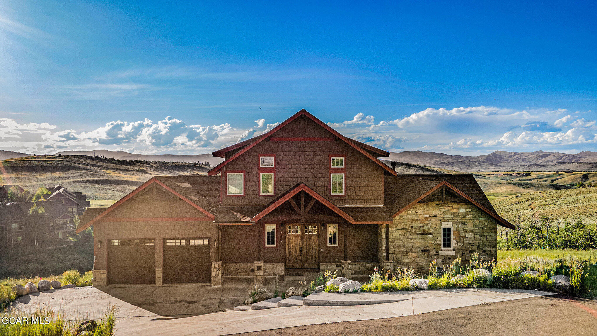 609 Lower Ranch View Drive Granby, CO 80446 - Photo 7 of 54 a front view of a house with a yard
