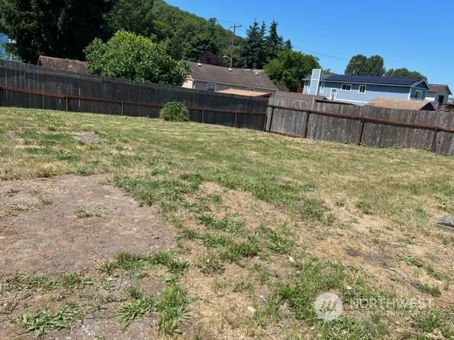 8843 3rd Avenue South Seattle, WA 98108 - Photo 16 of 39 a view of backyard with wooden fence