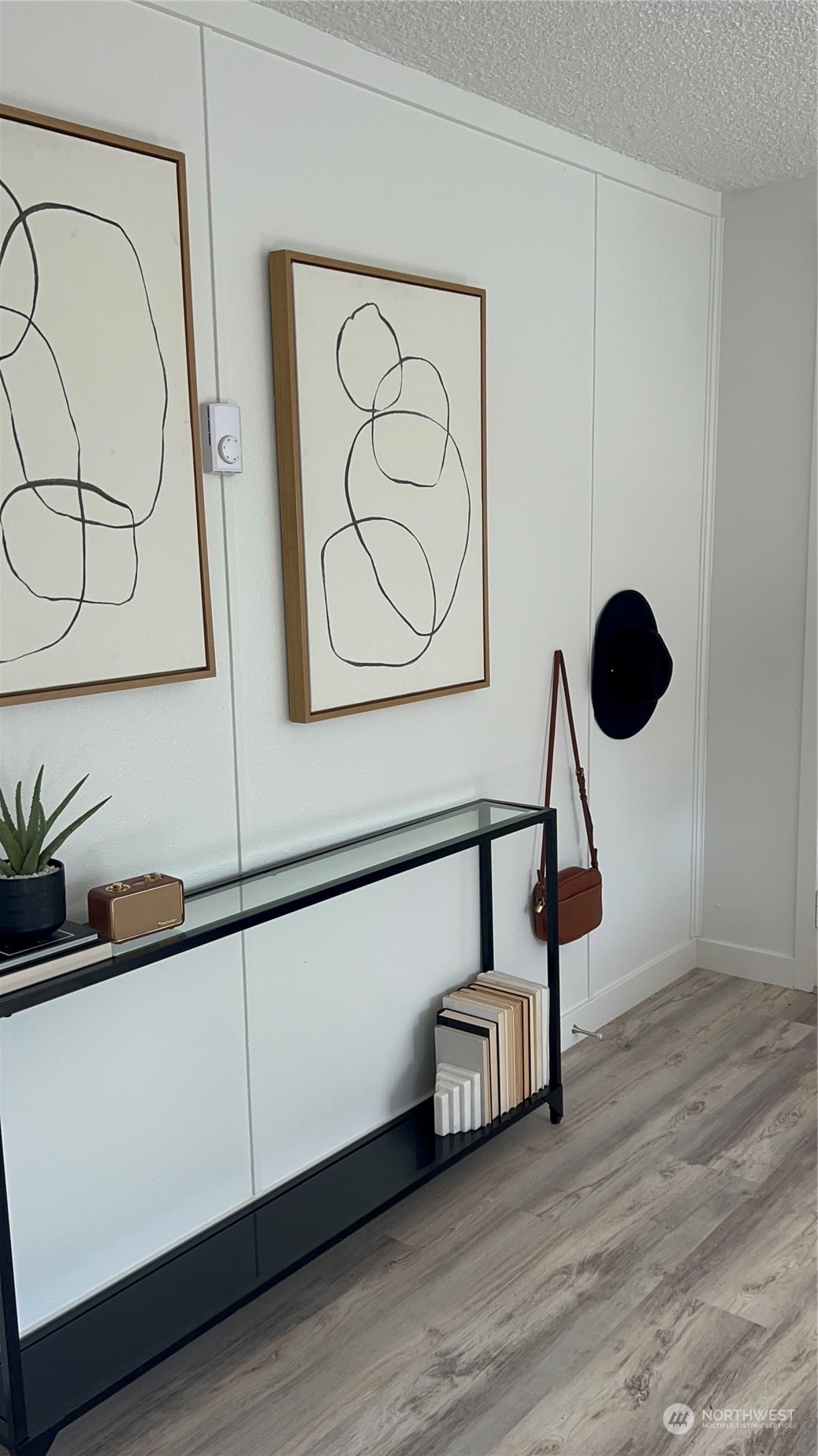 8843 3rd Avenue South Seattle, WA 98108 - Photo 24 of 39 a view of an entryway with wooden floor