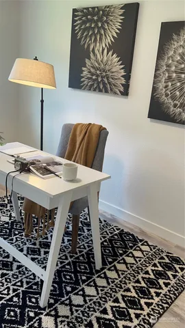 a view of a dining room with furniture