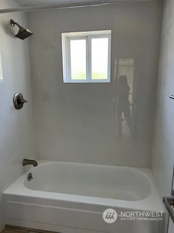 a bathroom with a tub