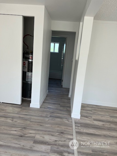 8843 3rd Avenue South Seattle, WA 98108 - Photo 8 of 39 a view of a hallway with wooden floor and staircase
