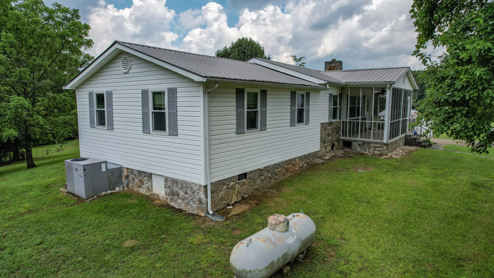 428 Caldwell Road Southeast Cleveland, TN 37323 - Photo 4 of 91 a view of a house with a backyard