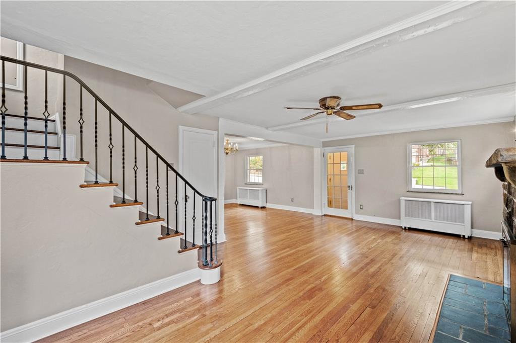 220 Cochran Road Mt. Lebanon, PA 15228 - Photo 12 of 35 a view of an empty room with wooden floor and a window