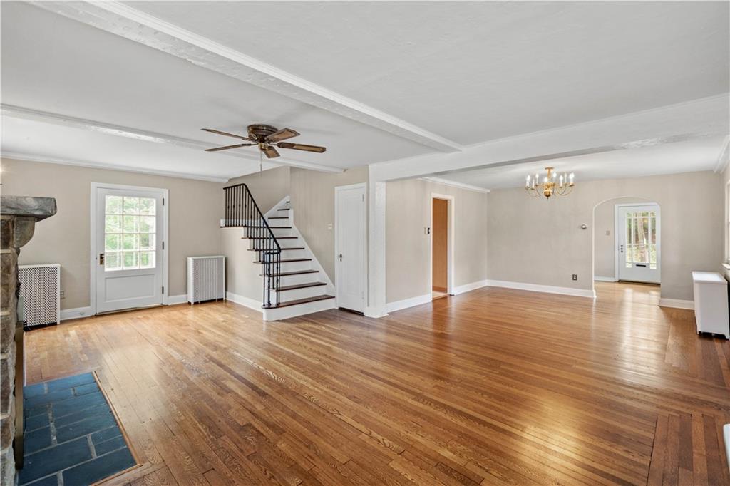 220 Cochran Road Mt. Lebanon, PA 15228 - Photo 13 of 35 wooden floor in an empty room with a window