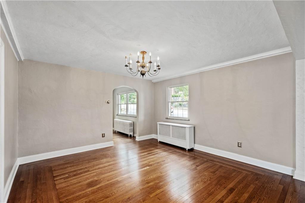 220 Cochran Road Mt. Lebanon, PA 15228 - Photo 15 of 35 a view of a room with wooden floor and window