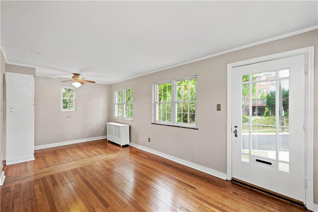 220 Cochran Road Mt. Lebanon, PA 15228 - Photo 22 of 35 wooden floor in an empty room with a window