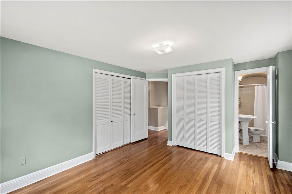 220 Cochran Road Mt. Lebanon, PA 15228 - Photo 25 of 35 an empty room with wooden floor and a window
