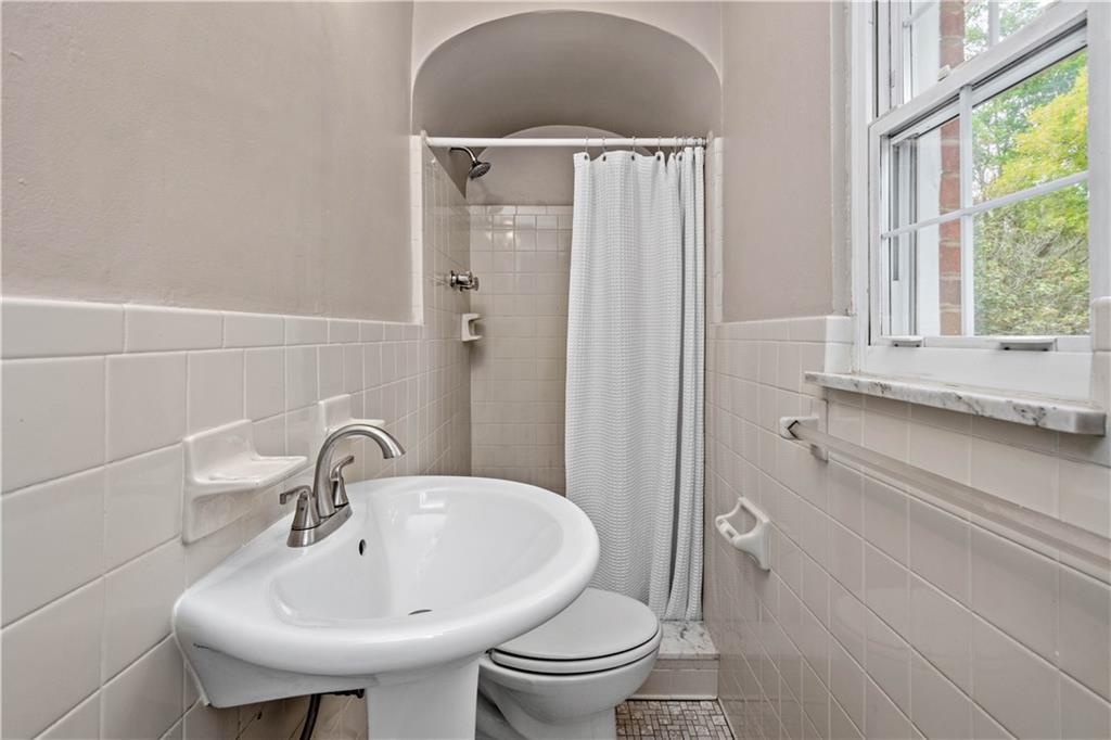 220 Cochran Road Mt. Lebanon, PA 15228 - Photo 26 of 35 a bathroom with a sink and a toilet