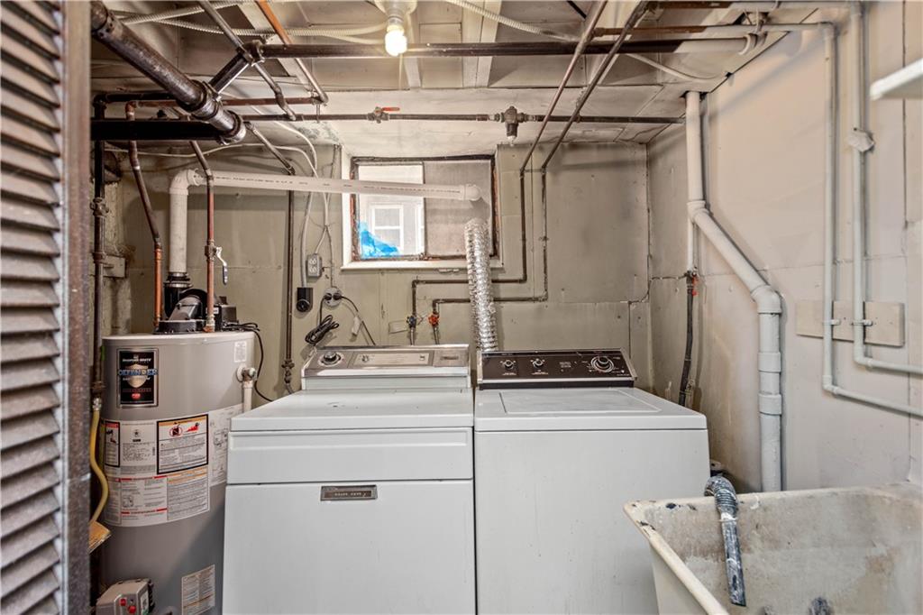220 Cochran Road Mt. Lebanon, PA 15228 - Photo 31 of 35 a utility room with dryer and washer