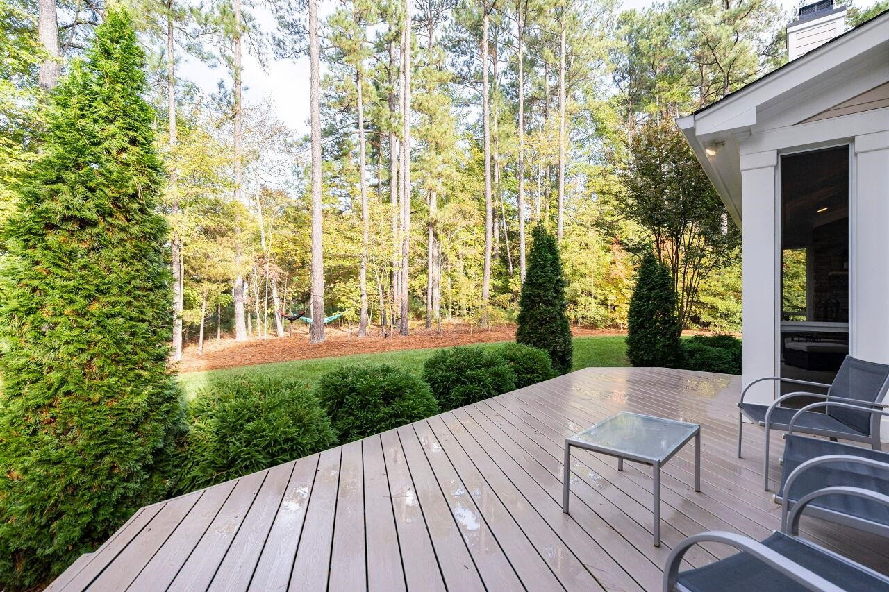 8401 Bournemouth Drive Raleigh, NC 27615 - Photo 38 of 41 Spacious Walk Out Deck with trek flooring. Deck